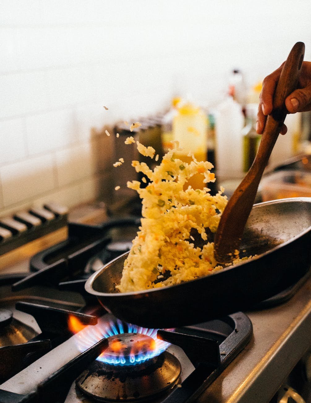 cooking fried rice in frying pan
